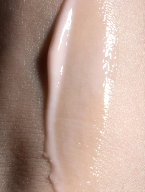 Hydrating serum applied to skin showing smooth absorption and natural glow without heaviness