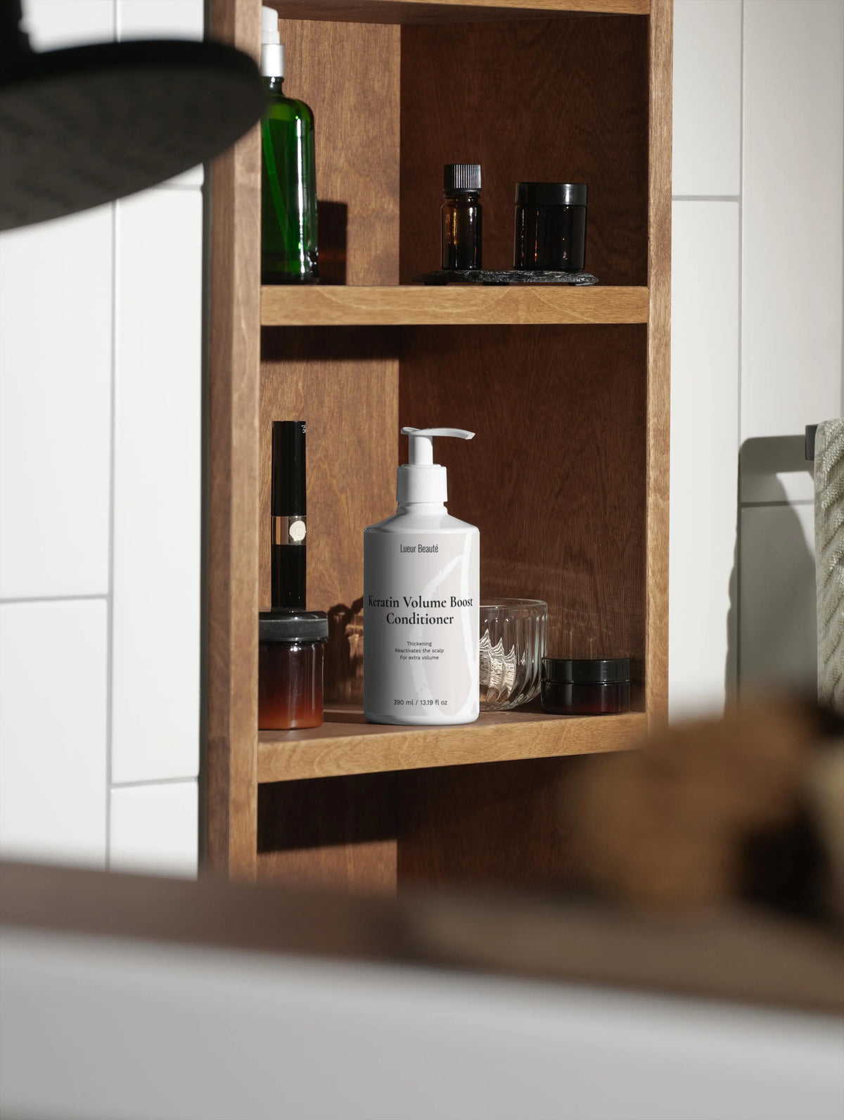 Lueur Beaute Keratin Volume Boost Conditioner natural volumizing hair conditioner in bathroom shelf styling