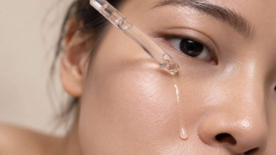 Bioactive Prebiotics Jelly Serum applied to skin with a glass dropper