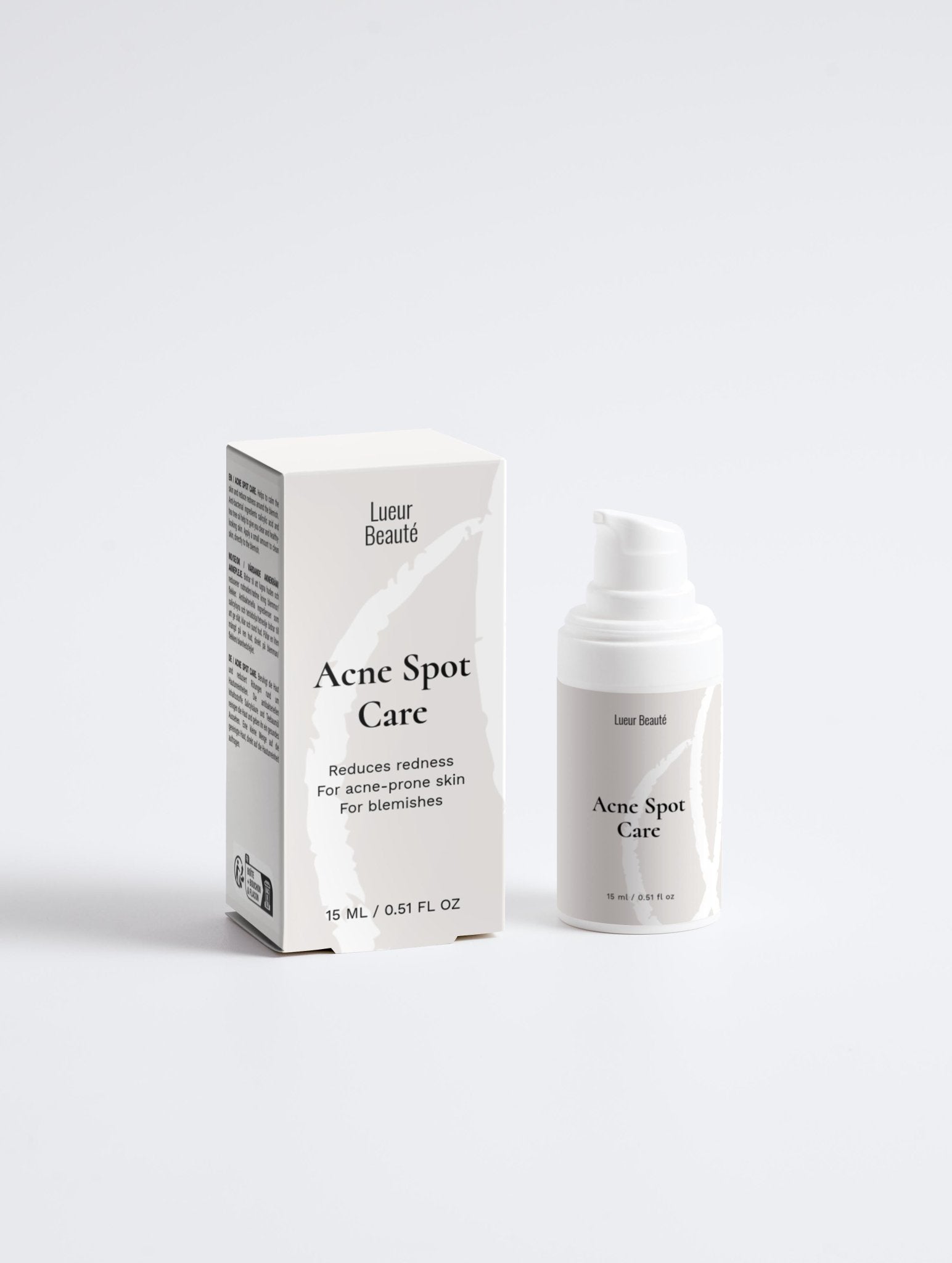 Lueur Beaute Acne spot care product packaging on a white background