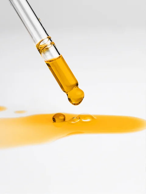 All-In-One Facial Oil texture with dropper showing nourishing facial oil consistency