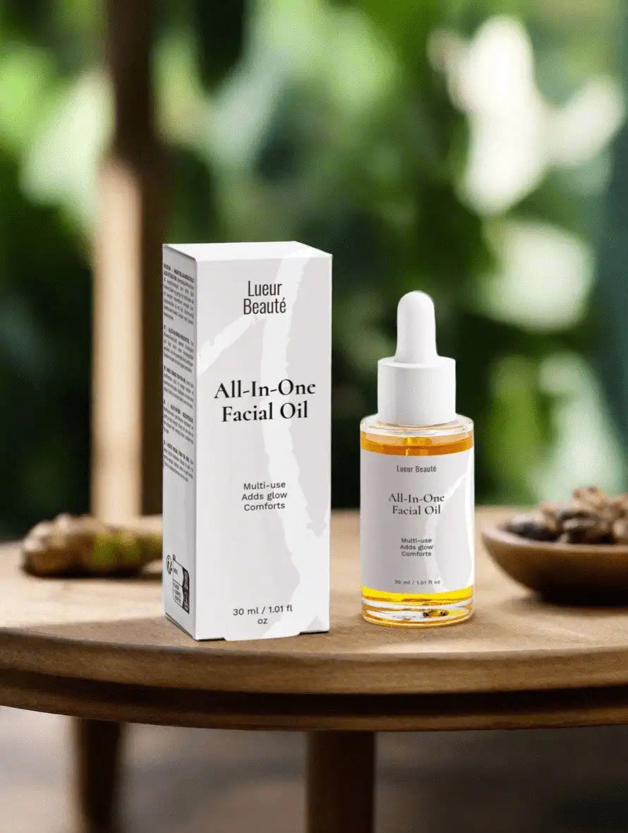 Lueur Beauté All-In-One Facial Oil with product box on wooden table, blurred green natural background