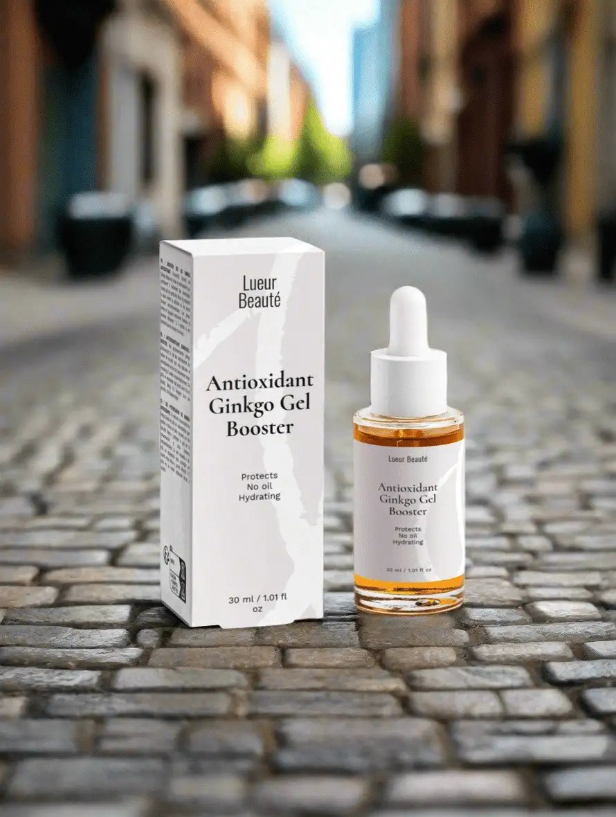 Lueur Beauté Antioxidant Ginkgo Gel Booster with packaging placed on cobblestone street, blurred city background