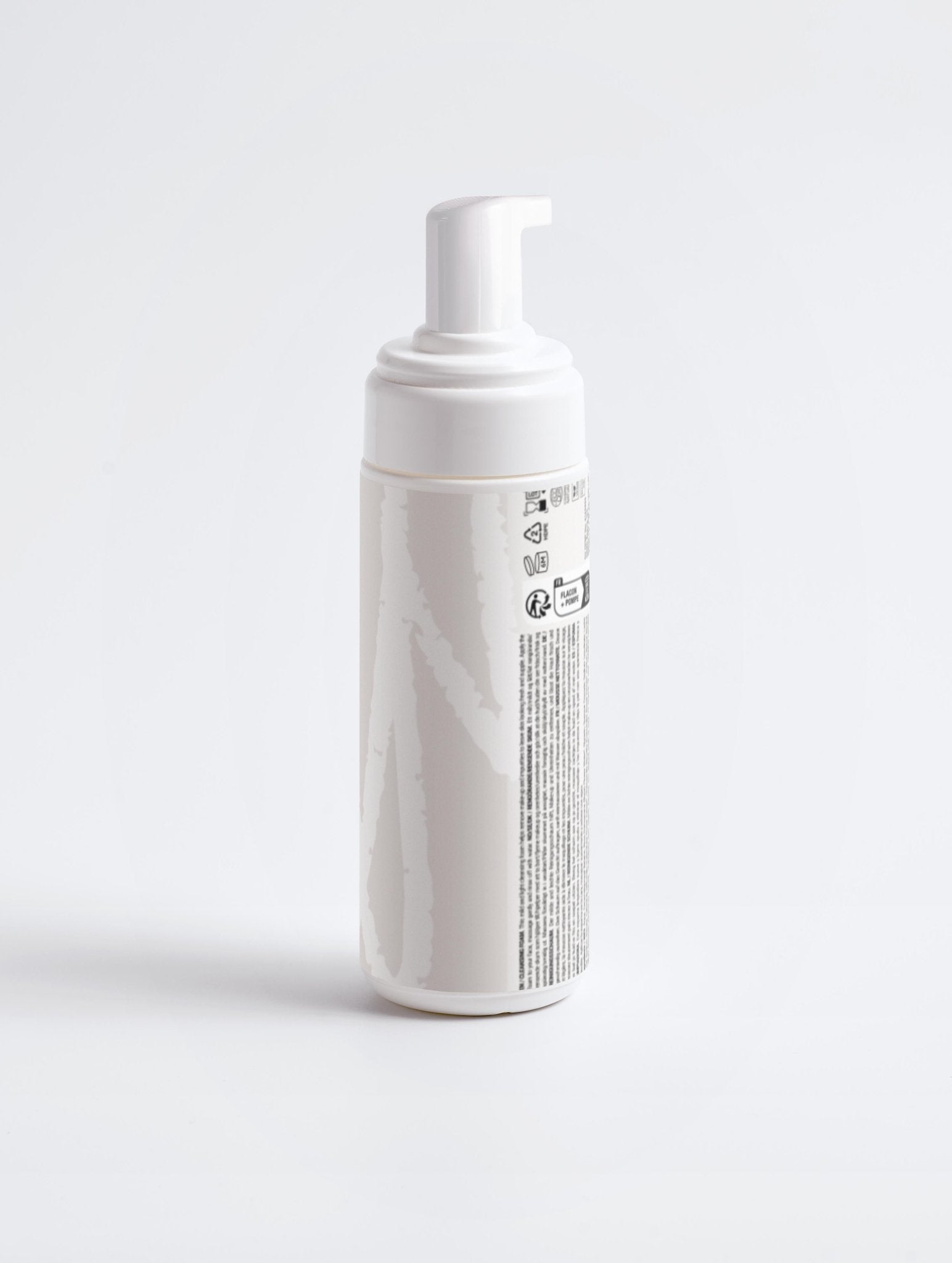 Cleansing Foam bottle photographed from the back on a clean white background.