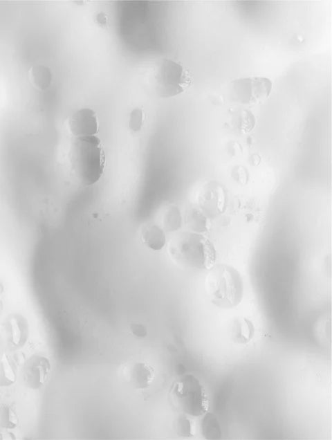 Lightweight airy texture of cleansing foam representing gentle daily cleansing without drying the skin