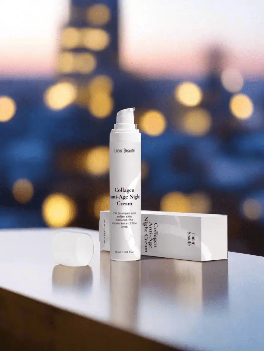 Lueur Beauté Collagen Anti-Age Night Cream with box on reflective surface with soft city bokeh background