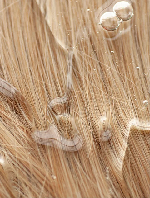 Lightweight colour care shampoo texture on coloured hair for gentle cleansing and shine