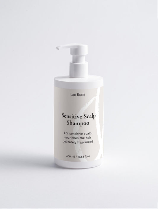 Sensitive Scalp Shampoo bottle on a light gray background