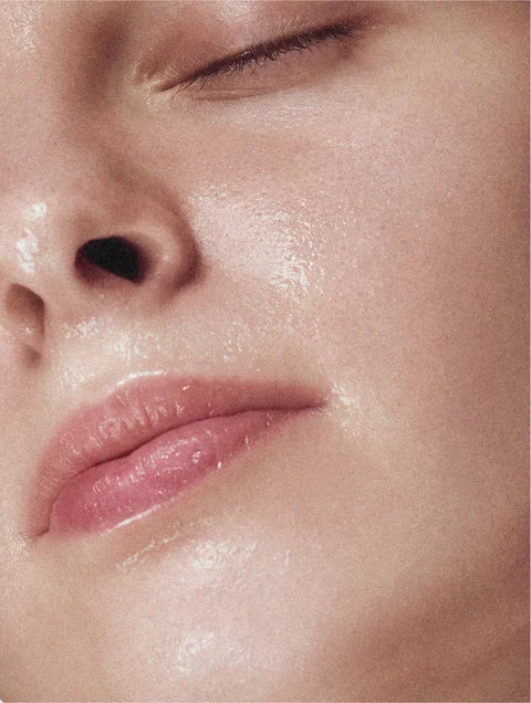 Glycolic acid exfoliating toner on skin helping improve smoothness and natural radiance