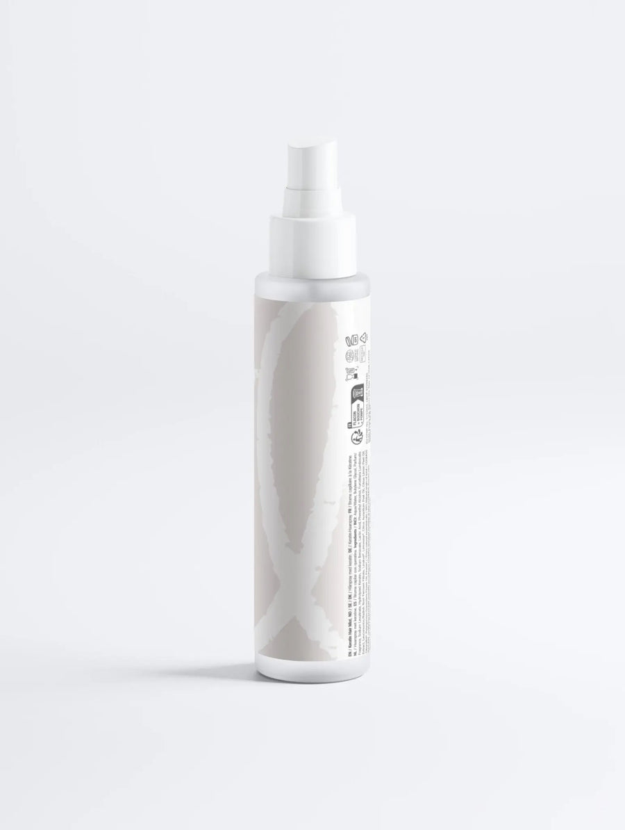 Back view of the Lueur Beauté Keratin Shine Leave-In Hair Mist bottle on a clean white background.