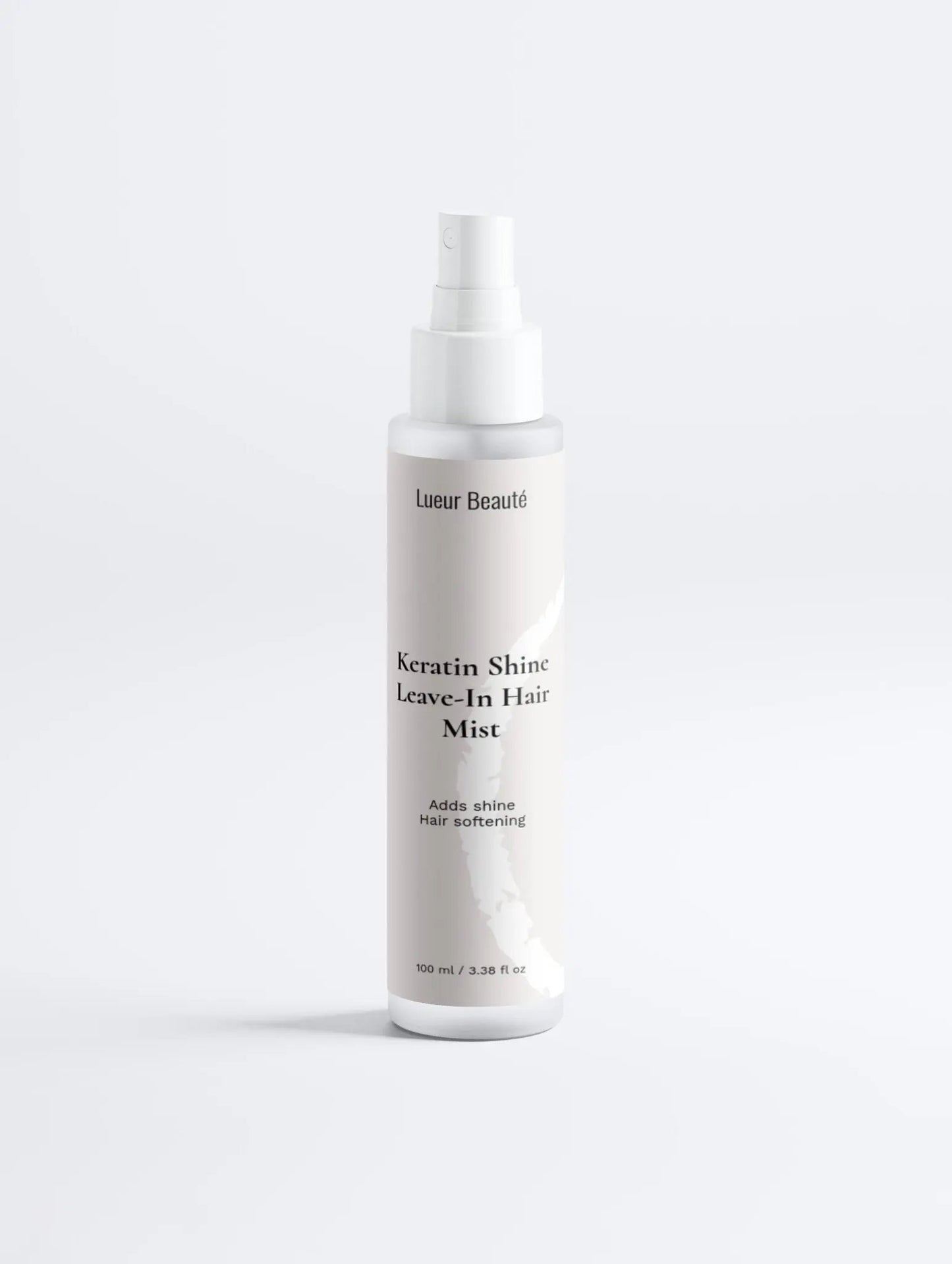 Front view of the Lueur Beauté Keratin Shine Leave-In Hair Mist bottle on a clean white background.