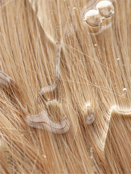 Keratin texture on hair strands showing strengthening and volumizing effect of keratin volume boost shampoo