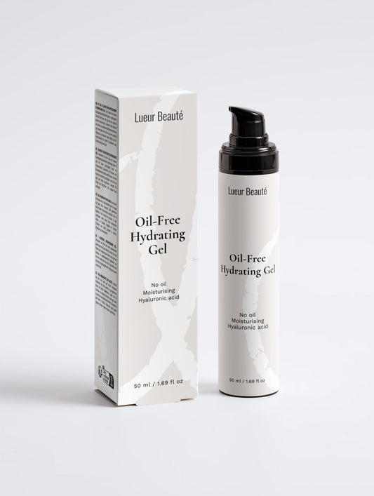 Lueur Beauté Oil-Free Hydrating Gel 50 ml pump bottle beside its box, shown from the front on a light grey background.