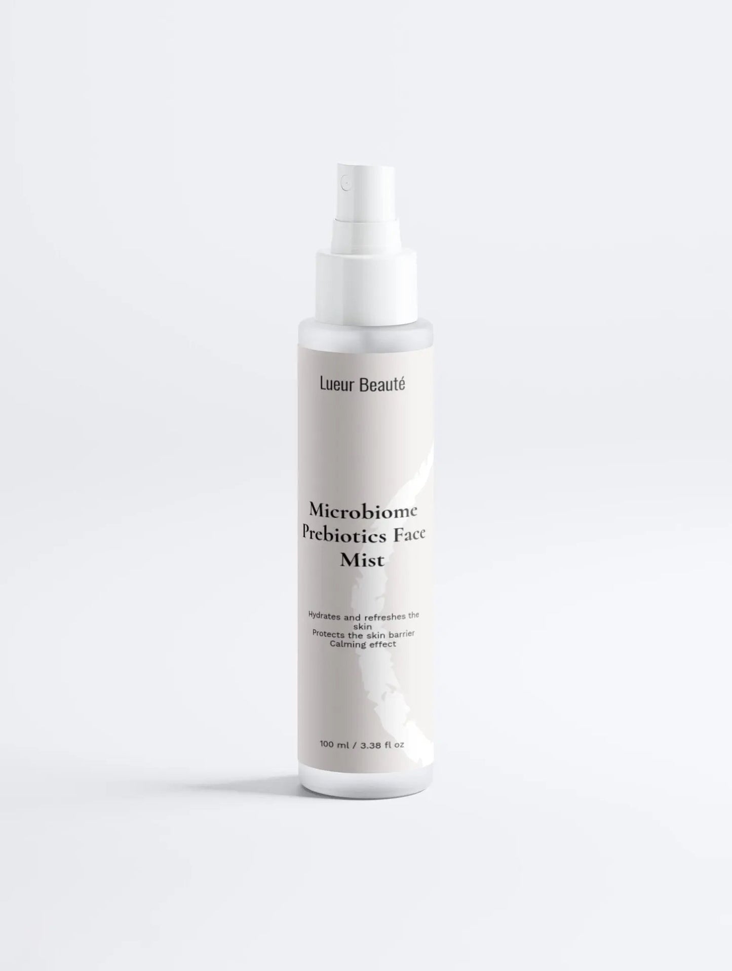 Lueur Beauté Microbiome Prebiotics Face Mist bottle standing on a clean white background, minimal product photo.