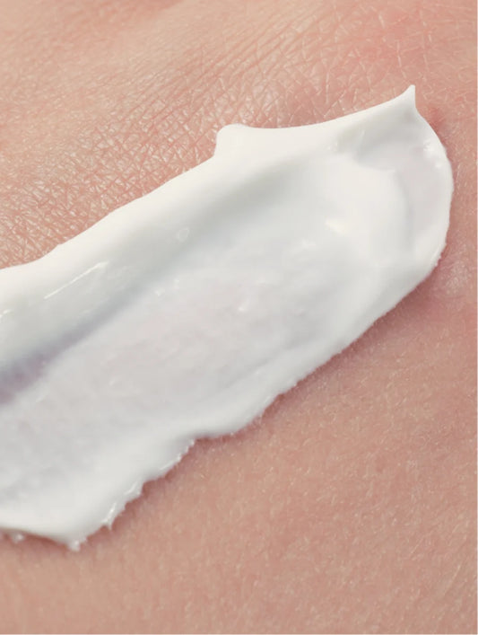 Mineral sunscreen SPF30 texture on skin showing gentle zinc oxide formula with no tint for face and body