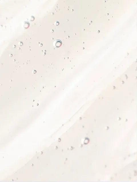 Hydrating niacinamide gel texture with bubbles showing lightweight skincare formula