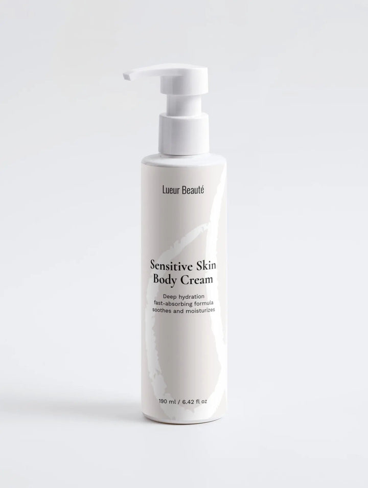 Lueur Beauté Sensitive Skin Body Cream bottle standing on a clean white background in a minimal studio setting.