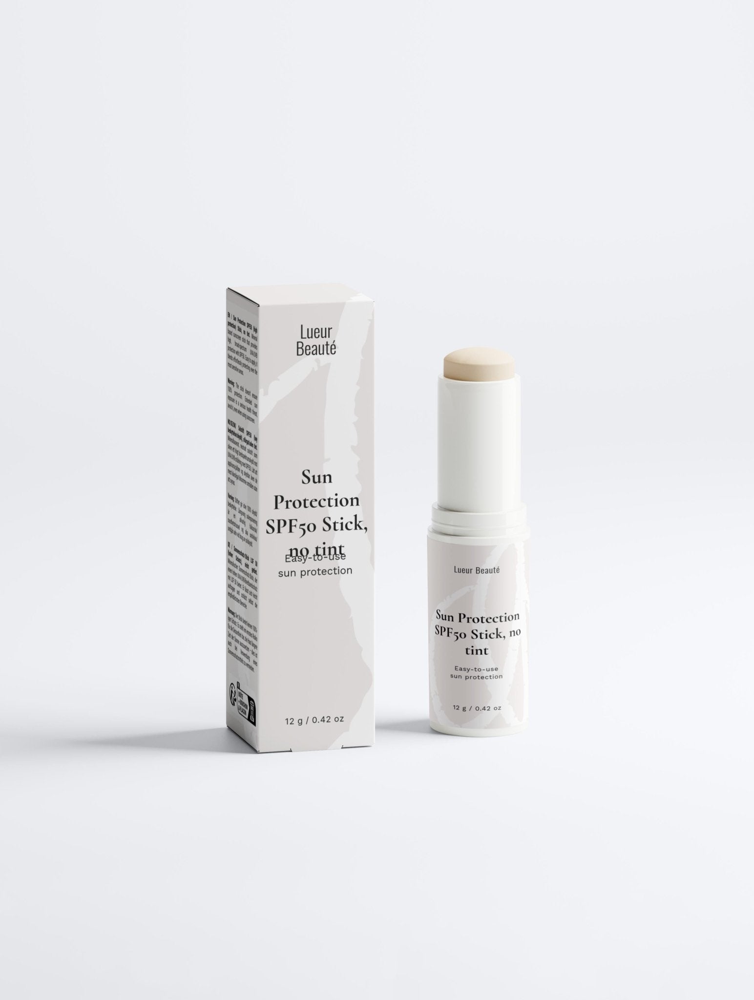 Sun protection SPF stick and packaging on a white background