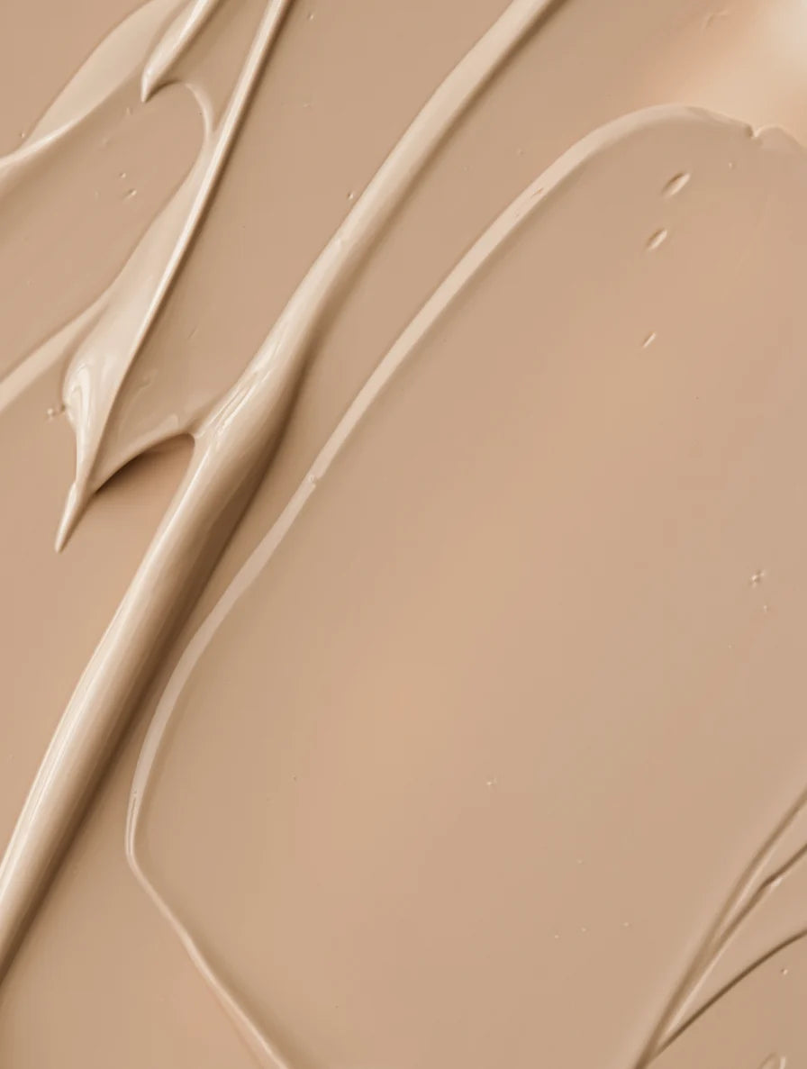 Close-up texture of tinted mineral sunscreen SPF30 with lightweight hydrating finish