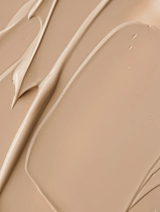 Close-up texture of tinted mineral sunscreen SPF30 with lightweight hydrating finish