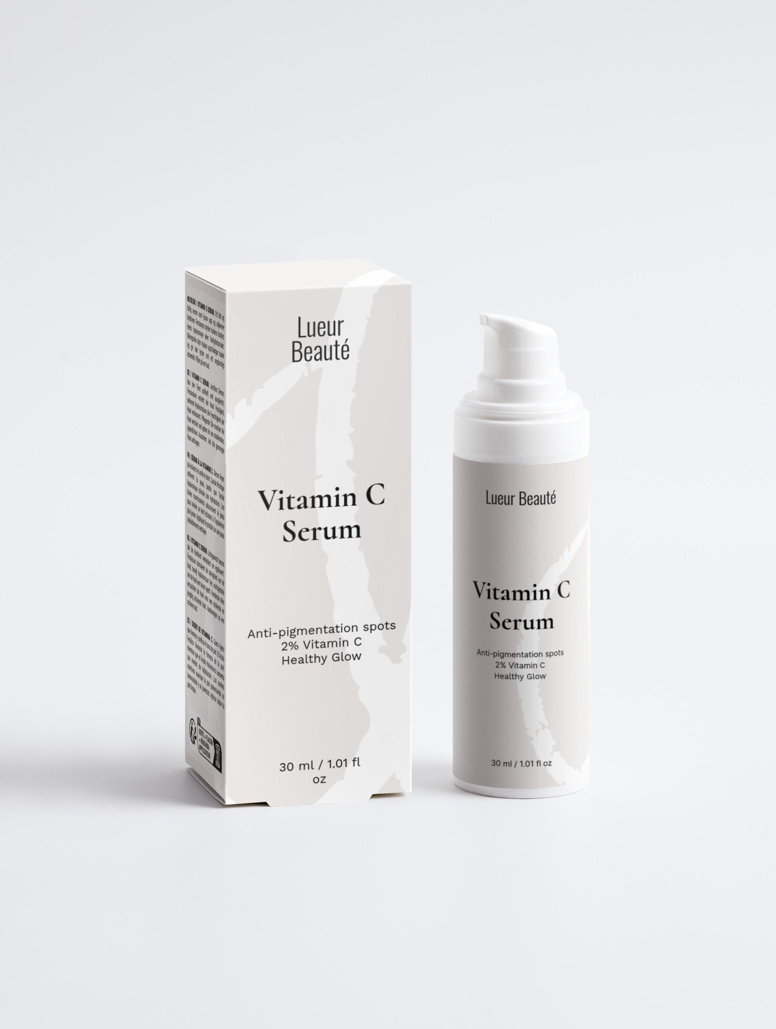 Lueur Beaute Vitamin C Serum packaging and bottle on a white background